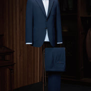 Classic two-button navy suit tailored for a sharp, sophisticated look. Perfect for formal events, this suit offers a high-end feel and eco-friendly craftsmanship. Ideal for women who appreciate luxury tailoring with sustainable materials.