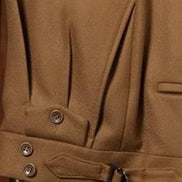 A detailed view of a premium dark beige safari suit, highlighting the stylish adjustable waistband with buckle detailing, perfect for a tailored and eco-friendly look at formal events.