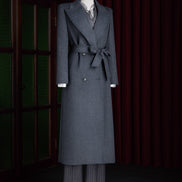 Full-length dark grey overcoat on a mannequin, featuring a waist tie belt and elegant double-breasted buttons, ideal for a sophisticated winter wardrobe.