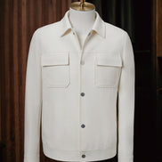 Front view of The Couturist's white tailored jacket, perfect for women seeking elegant high-end fashion. Made from premium fabrics for formal occasions.